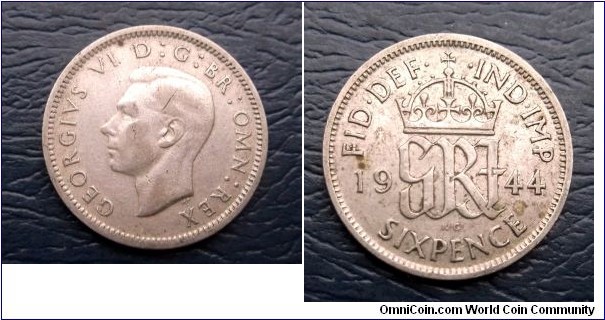 Silver 1944 Great Britain 6 Pence George VI KM# 852 Nice Toned Circ Go Here:

http://stores.ebay.com/Mt-Hood-Coins
