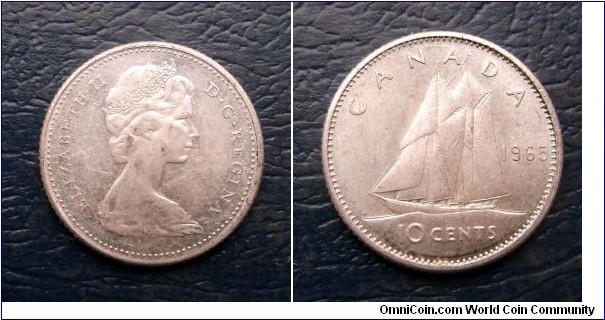 Silver 1965 Canada 10 Cents QEII KM#61 Sailboat Nice Toned Circ 
Go Here:

http://stores.ebay.com/Mt-Hood-Coins