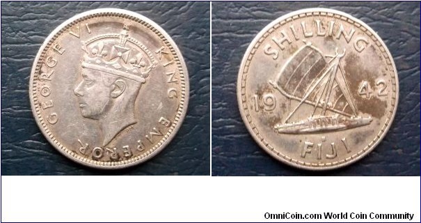 Silver 1942 Fiji Shilling KM#12a Popular Outrigger Boat 1st Year Nice Circ Go Here:

http://stores.ebay.com/Mt-Hood-Coins