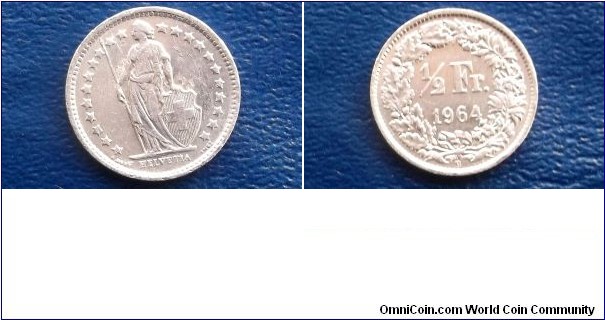 Silver 1964-B Switzerland 1/2 Franc Standing Helvetia Lance High Grade Go Here:

http://stores.ebay.com/Mt-Hood-Coins