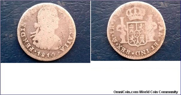 Silver 1810 Mexico Colonial 1 Real Ferdinand VII Nice Toned Circ 
Go Here:

http://stores.ebay.com/Mt-Hood-Coins
