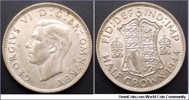 Silver 1944 Great Britain 1/2 Crown George VI Nice Grade Large 32.3mm 
Go Here:

http://stores.ebay.com/Mt-Hood-Coins