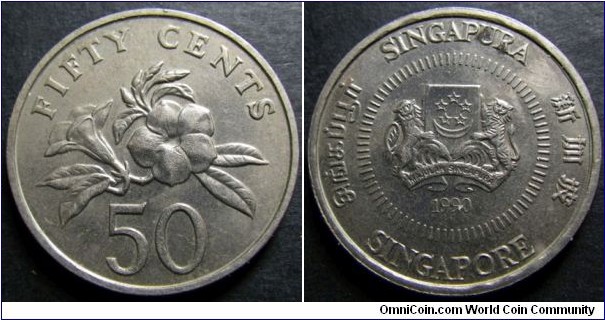 Singapore 1990 50 cents. Mechanical doubling on the legend. Not normally seen on Singaporean coins. A real pity on the stain. Weight: 7.19g