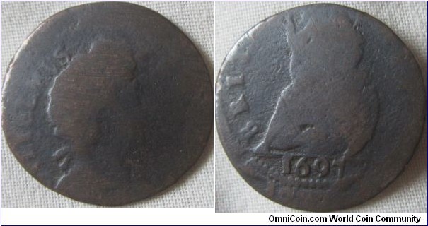 1697 farthing, off centre strike low grade