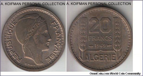 KM-91, Algeria 1949 20 francs; copper-nickel, reeded edge; almost uncorculated for wear but irt is colorfully toned as if it had been in the fire, more common first year of the two-year type.