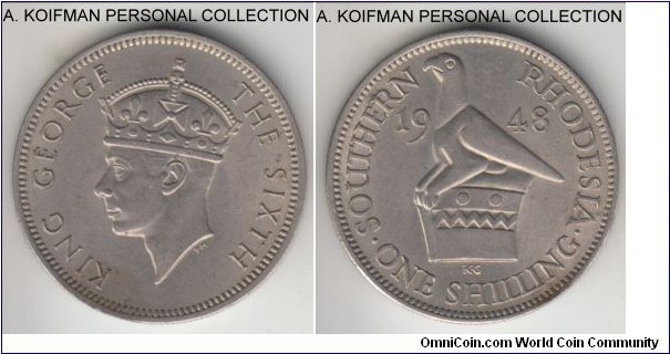 KM-22, 1948 Southern Rhodesia shilling; copper-nickel, reeded edge; last George VI type, uncirculated details, but a couple of stains.