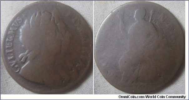 1694 halfpenny, large flan and weak strike reverse.