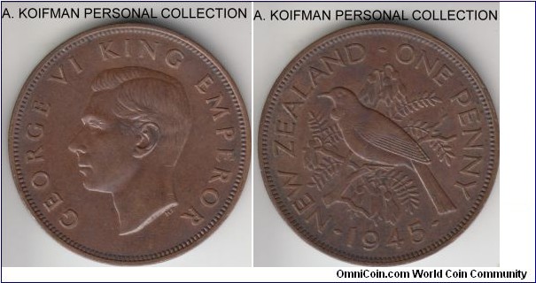 KM-13, 1945 New Zealand penny; bronze, plain edge; about uncirculated detail, however color of the coin is not natural, possibly artificially toned.