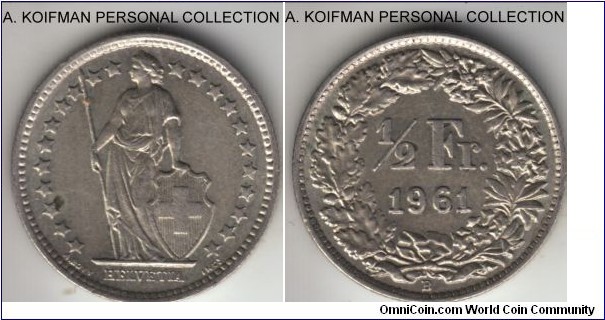 KM-23, 1961 Switzerland 1/2 franc; silver, reeded edge; toned average uncirculated or almost.
