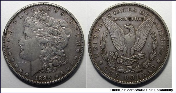 1889 Morgan Dollar, Rim dents.