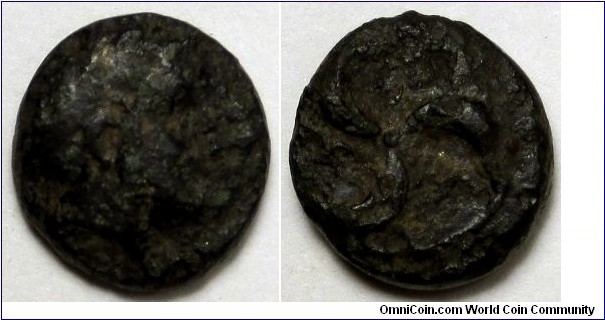 Thebe, Mysia, AE 9mm, 400-300 BC. Head right, hair in a sakkos / QHB within the section of a triskeles right.