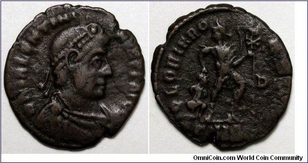 Valentinian I, AE3, Siscia. DN VALENTINI-ANVS PF AVG, pearl diademed, draped, cuirassed bust right / GLORIA RO-MANORVM, Emperor in military dress, walking right, head left, holding labarum, dragging captive behind him. Right field: D. Mintmark: star gamma SISC.