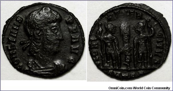 Constans, AE4. CONSTANS-PF AVG, laureate and rosette-diademed, draped, cuirassed bust right / GLORI-A EXER-CITVS, two soldiers holding spears and shields with one standard between them. Mintmark: SMTSΓ