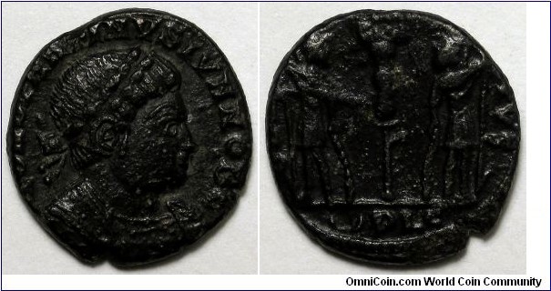 Constantine II, AE follis, Lyons. AD 337-348. CONSTANTINVS IVN NOB C, laureate, cuirassed bust right / GLOR-IA EXERC-ITVS, two soldiers holding spears and shields with one standard between them. Mintmark: crescent PLG. 