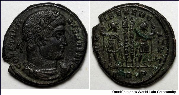 Constantine I AE follis. AD 330-335. Trier. CONSTANTI-NVS MAX AVG, rosette-diademed, draped, cuirassed bust right / GLOR-IA EXERC-ITVS, two soldiers holding spears and shields with two standards between them. Standards have no drapery and very thin shafts with pointed tops instead of banners. Mintmark: TR dot P.