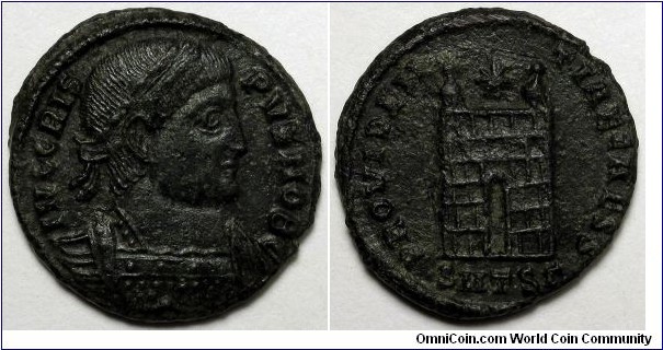 Crispus AE follis.. 326 AD. IVL CRISPVS NOB C, laureate cuirassed bust right / PROVIDENTIA CAESS, Campgate with two turrets & star above. Mintmark SMTSΓ.