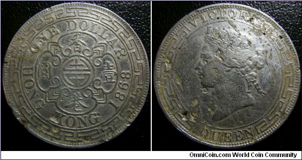 Hong Kong 1868 1 dollar. Some corrosion. Weight: 26.80g