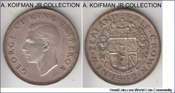 KM-11, 1942 New Zealand 1/2 crown; silver, reeded edge; George VI, second smallest mintage, nicely toned about uncirculated or better specimen.