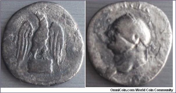 76Ad.Vespasian, Denarius. IMP CAESAR VESPASIANVS AVG, COS-VII, eagle standing facing on garlanded base, head left. 17mm - 2.67g.