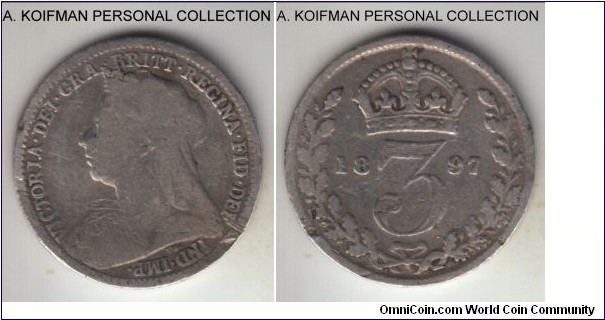 KM-777, 1897 Great Britain 3 pence; silver, plain edge; Victoria mature veiled head, good or about, cleaned and few marks.
