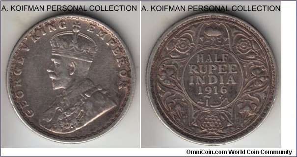 KM-522, 1916 British India 1/2 rupee, Bombay mint (dot under flower); silver, reeded edge; toned good very fine.