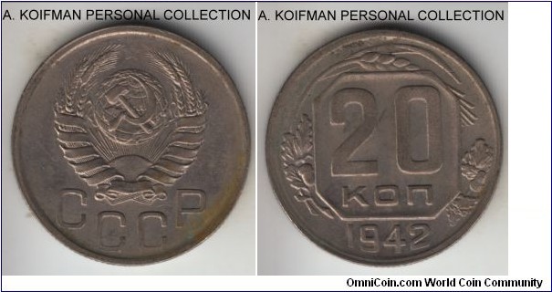 Y#111, 1942 Russia (USSR) 20 kopeks; copper-nickel, reeded edge; this is a common sister to a rare 10 kopeks, WWII mintage that can partially explain the poor quality of strike, uncirculated for wear but unattractive toning.