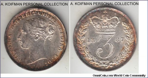 KM-730, 1887 Great Britain 3 pence; silver, plain edge; last year of the young head effigy type, brilliant uncirculated with heavy peripheral toning.