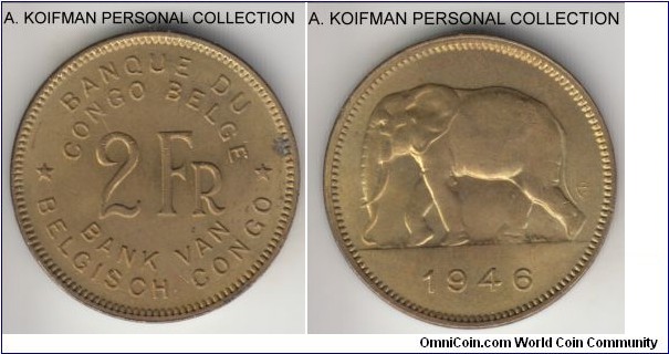 KM-28, 1946 Belgian Congo 2 francs; brass, plain edge; scarce in high grades, average uncirculated or so, small spot on obverse.