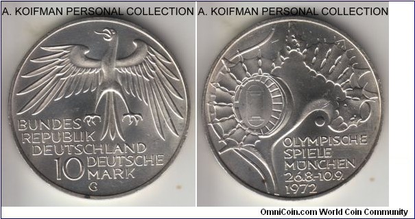 KM-133, 1972 Germany 10 mark, Karlsruhe mint (G mintmark); silver, lettered edge; business strike, Munich Olympics commemorative - stadium aerial view, uncirculated but a couple of small spots.