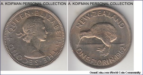 KM-28.2, 1962 New Zealand florin (2 shilling); copper-nickel, reeded edge; Elizabeth II late pre-decimal coinage, average uncirculated with lightly toned obverse and lustrous reverse.