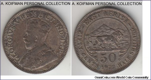 KM-20, 1922 East Africa 50 cents, Royal Mint (no mint mark); silver, reeded edge; George V, darker turned (as common with uncleaned coins of low 250 silver content) obverse is almost very fine, reverse is typically better, extra fine or almost, interesting flan defect across obverse.