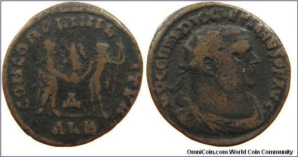 Circa 296-297 Diocletian Follis. CONCORDIA MILITVM, Jupiter presents Victory on a globe to Diocletian. Delta between them. IMP CC VAL DIOCLETIANVS PF AVG, radiate, draped and cuirassed bust right. Mintmark ALE= Alexandria