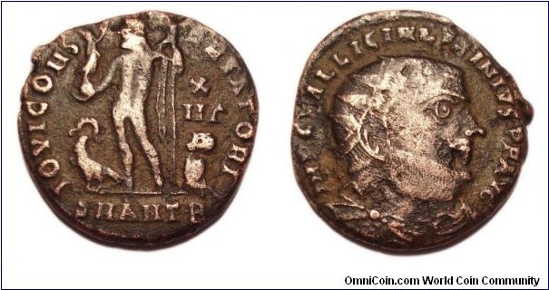 321-323Ad Licinius I Follis
IOVI CONSERVATORI Jupiter standing left, cloak across left shoulder, Victory on globe in right hand, eagle-tipped scepter in left, eagle with wreath left, captive right, X over II Mu right field
IMP C VAL LICIN LICINIVS PF AVG radiate, draped, cuirassed bust right
RIC VII 35 - Antioch Mintmark=SMANTB