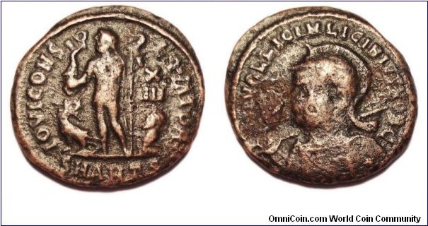 321-323Ad Licinius II Follis
IOVI CONSERVATORI Jupiter standing left, cloak across left shoulder, Victory on globe in right hand, eagle-tipped scepter in left, eagle with wreath left, captive right, X over II Mu right field
DN VAL LICIN LICINIVS NOB C helmeted, cuirassed bust left, spear across right shoulder, shield on left arm
RIC VII 36 - Antioch Mintmark=SMANTS