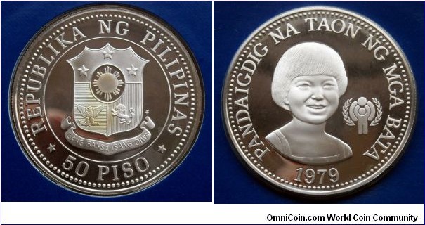 Philippines 50 piso.
1979, International Year of the Child. 
Ag 925. Weight; 27,39g. Diameter; 40 mm. Proof from Franklin Mint. Mintage: 27.000 pieces.