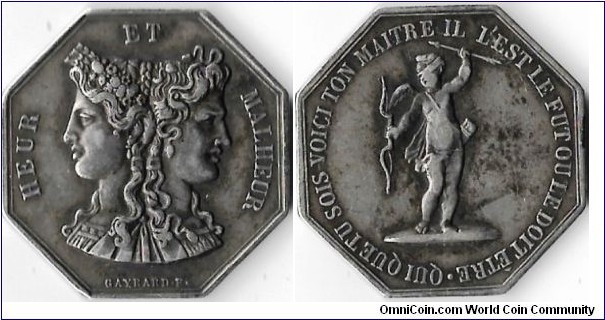 silver gaming token. Obverse: Good luck / bad luck janiform head. Reverse: Cupid blindfolded