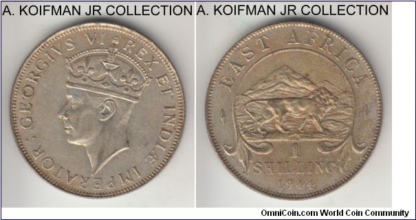 KM-28.1, 1944 East Africa shilling, Heaton mint (H mint mark); 0.250 silver, reeded edge; George VI, almost uncirculated, yellowish toning due to low silver content.