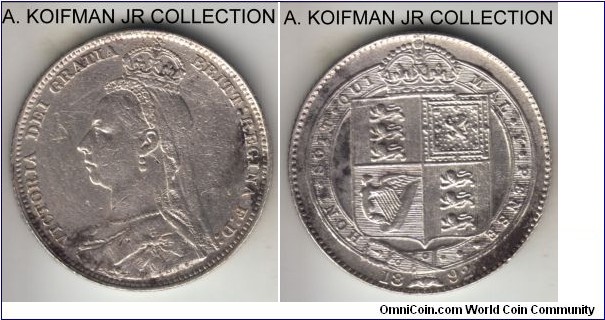 KM-774, 1892 Great Britain shilling; silver, reeded edge; Victoria veiled head type, about extra fine details, but stained and then cleaned, harshly on obverse.