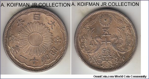 KM-50, Showa Yr.11 (1936) Japan 50 sen; silver, reeded edge; Hirohito, common coin in lightly and pleasantly toned uncirculated condition.