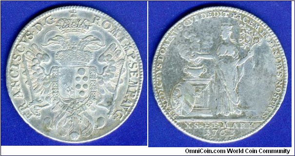 Conventionsthaler.
Free city of Nürnberg.
Franc I (1745-1765), Emperor of Holy Roman empire.
Thaler is dedicated to the signing of a peace treaty signed in the Saxon hunting castle Hubertusburg (German: Hubertusburg), near Leipzig on February 15, 1763 between Prussia, Austria and Saxony, which ended the Seven Years War (1756-1763).
*S.F.* - Scholtz & Forster 1760-64.


Ag833f. 28,06gr.