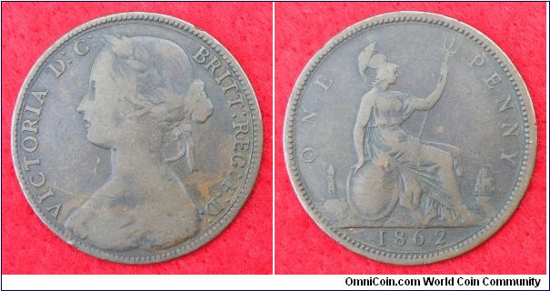 UK Penny: 1862 Freeman 38; 2+G. About VG.