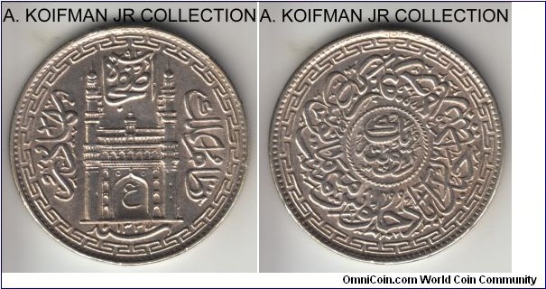 Y#53a, AH1337//8 (1918) India Princely State Hyderabad rupee; silver, reeded edge; Mir Usman Ali Khan, more common year of the issue, light circulation but edge damaged in a couple of places and possibly ex-jewelry.