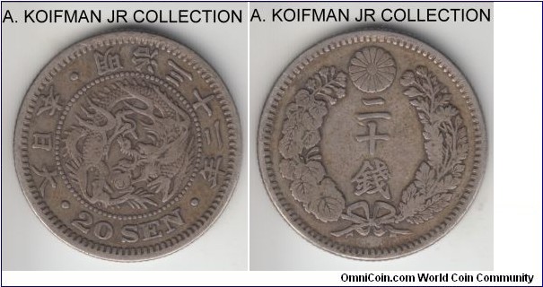 Y#24, Meiji Yr 32 (1899) Japan 20 sen; silver, reeded edge; Matsuhito, common, decent very fine or about.