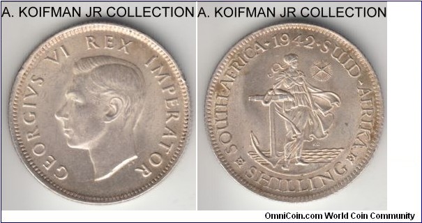 KM-28, 1942 South Africa (Dominion) shilling; silver, reeded edge; George VI war time coinage, average partially toned uncirculated.
