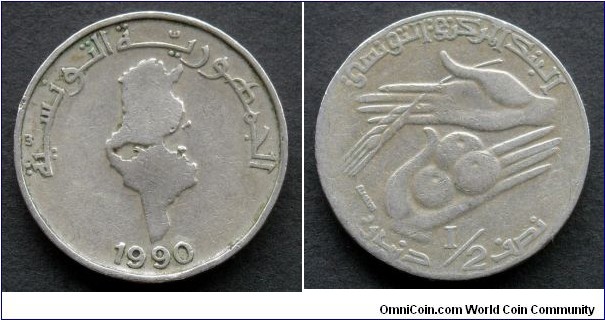 Tunisia 1/2 dinar.
1990