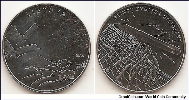 1.5 Euro KM#NEW 11.10 g., Copper-Nickel, 27.5 mm Series: Lithuanian Nature. Both sides of the coin depict smelt fishing by attracting: wooden mallets rhythmically strike the end of a board placed in a man-made hole in the ice and create vibrations that attract the fish; the vibrations make them turn in circles and ultimately get entangled in the nets. The obverse of the coin portrays the view from above the ice. It features Vytis, the coat of arms of the Republic of Lithuania, formed as if from frost, the inscription LIETUVA (LITHUANIA), the year of issue (2019) and denomination €1,5. Both sides of the coin depict smelt fishing by attracting: wooden mallets rhythmically strike the end of a board placed in a man-made hole in the ice and create vibrations that attract the fish; the vibrations make them turn in circles and ultimately get entangled in the nets. The reverse of the coin portrays the view from below the ice and fish caught in the nets. A pad-printing technology was used to create the iridescent sheen on the fish. It features the inscription STINTŲ ŽVEJYBA VILIOJANT (SMELT FISHING BY ATTRACTING) and the mintmark of the Lithuanian Mint. Designed by Eglė Ratkutė. Mintage 30,000 pcs. Issued 29-01-2019. The coin was minted at the state enterprise Lithuanian Mint.