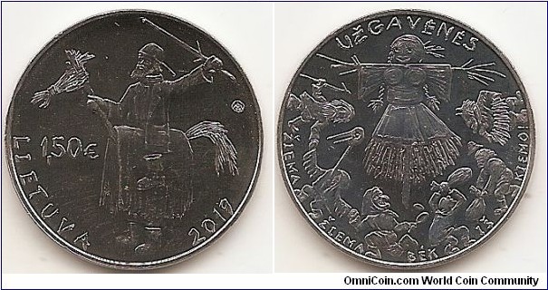 1.5 Euro KM#NEW 11.10 g., Copper-Nickel, 27.5 mm. Series: Traditional Lithuanian Celebrations. The obverse of the coin features a character of Užgavėnės – a horse rider, i.e. a person dressed up in a costume that makes him appear to be riding a horse. It also features the inscription LIETUVA (LITHUANIA), the year of issue (2019), denomination (€1.5), and the mintmark of the Lithuanian Mint. The reverse of the coin features distinctive attributes characteristic of Užgavėnės, a lively end-of-winter celebration: in the centre – Morė, the effigy of winter, surrounded by a beggar, a crane, a witch baking pancakes, Lašininis, a symbol of winter, Kanapinis, a symbol of spring, and a goat playing an accordion. The composition is surrounded by the inscription UŽGAVĖNĖS and the slogan of the celebration: ŽIEMA, ŽIEMA, BĖK IŠ KIEMO! (WINTER, WINTER GO AWAY!). Designed by Giedrius Paulauskis. Mintage 30,000 pcs. Issued 19-02-2019. The coin was minted at the state enterprise Lithuanian Mint.