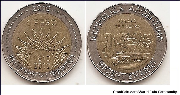 1 Peso
KM#159
6.35 g., Bi-Metallic Aluminum-Bronze center in Copper-Nickel ring, 23 mm. Subject: Bicentennial - Pucara de Tilcara Obv: Stylized radiant sun, denomination and date. Rev: Cactus and mountains