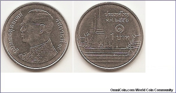 1 Baht
BE2552
Y#443
3.00 g., Nickel Plated Steel, 20 mm. Ruler: Rama IX (1946-2016) Obv: Image of King Bhumibol Adulyadej (Rama IX) facing left, with an inscription around edge. Rev: Phra Kaew Temple in Bangkok, state name, denomination 1 บาท, and year of issue in Thai lunar year. Edge: Reeded 