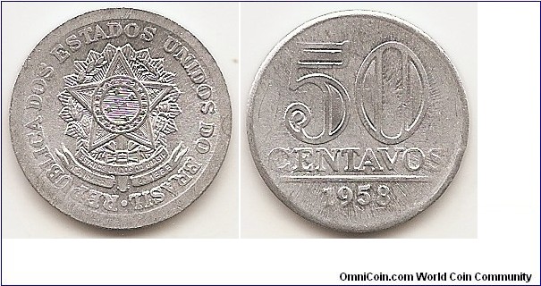 50 Centavos
KM#569
1.83 g., Aluminum, 21.07 mm. Obv: National arms Rev: Denomination above line, date below Edge: Plain